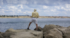 Would you stay fishing in one spot for hours on end if you didn't get any bites? Man-fishing-small
