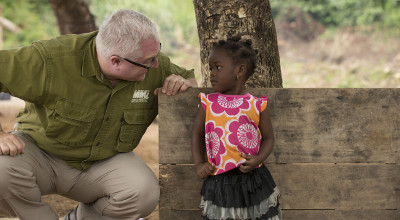 Medical Ministry International's Sam Smith laughs with a young girl from Ghana, Africa. Sam Smith